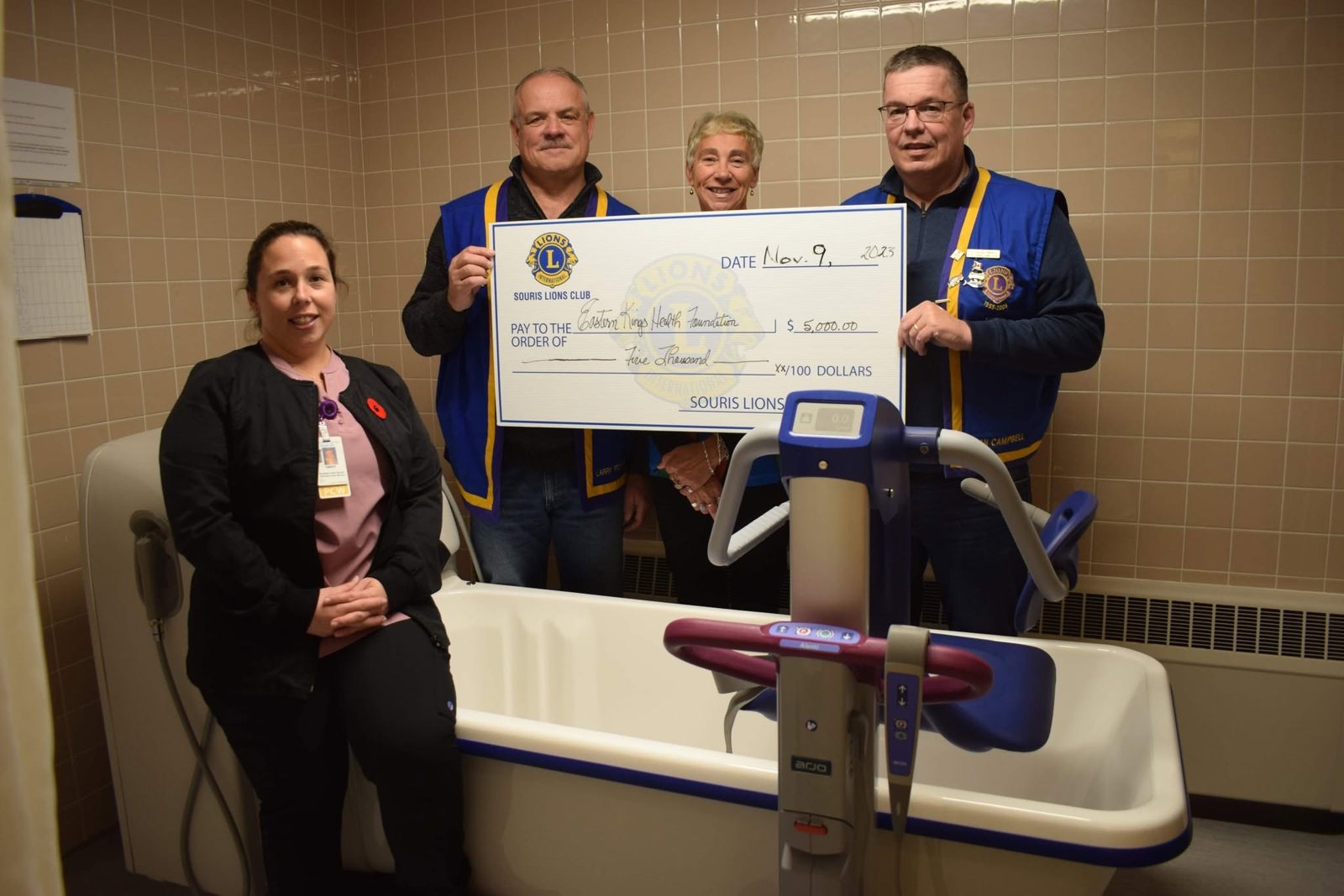 PCW Amber Townshend, Lions and EKHF members with the new Century Tub at Souris Hospital