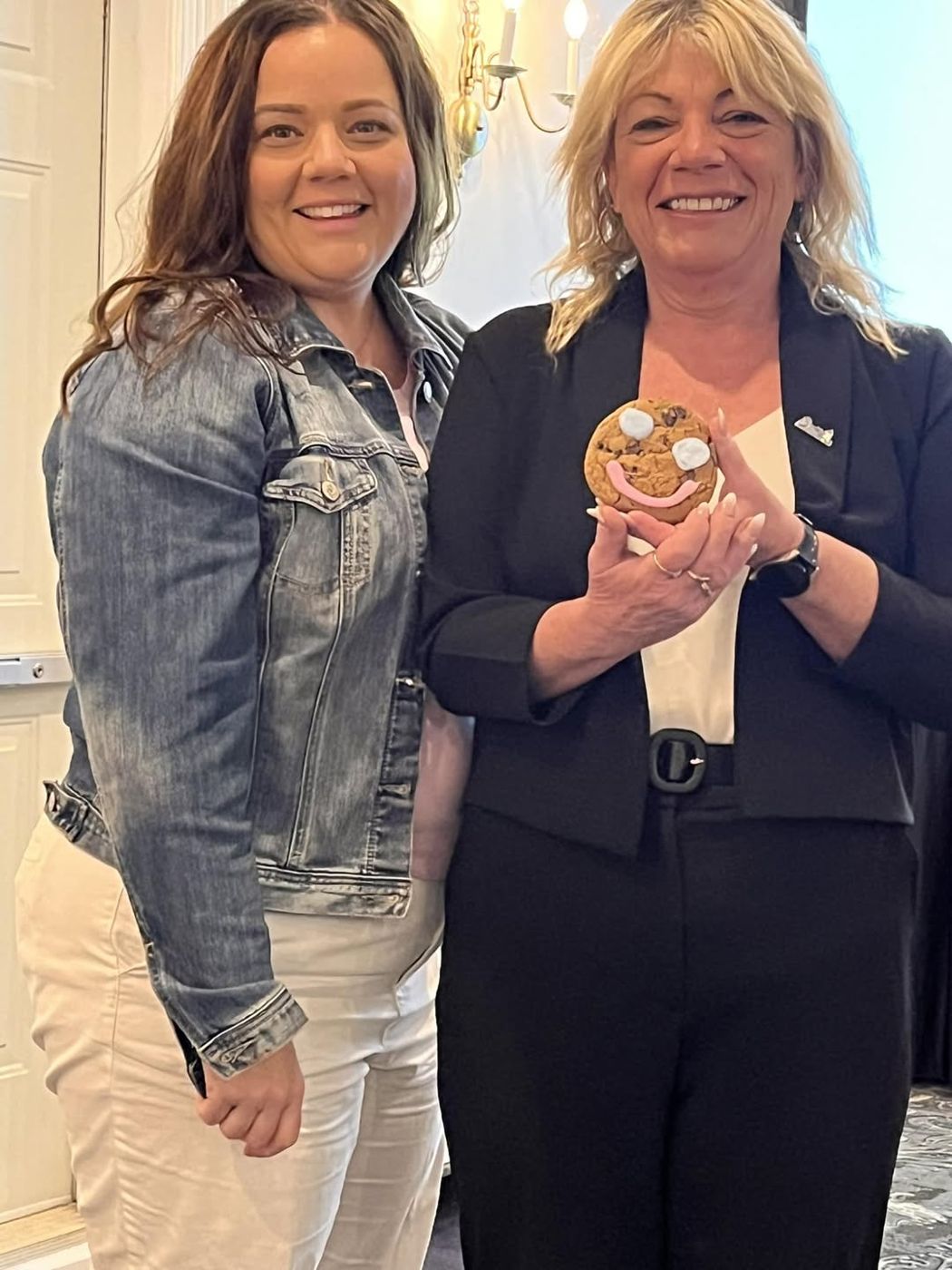 Souris Mayor Dunphy with director Stephanie Mitsuk and a Smile Cookie