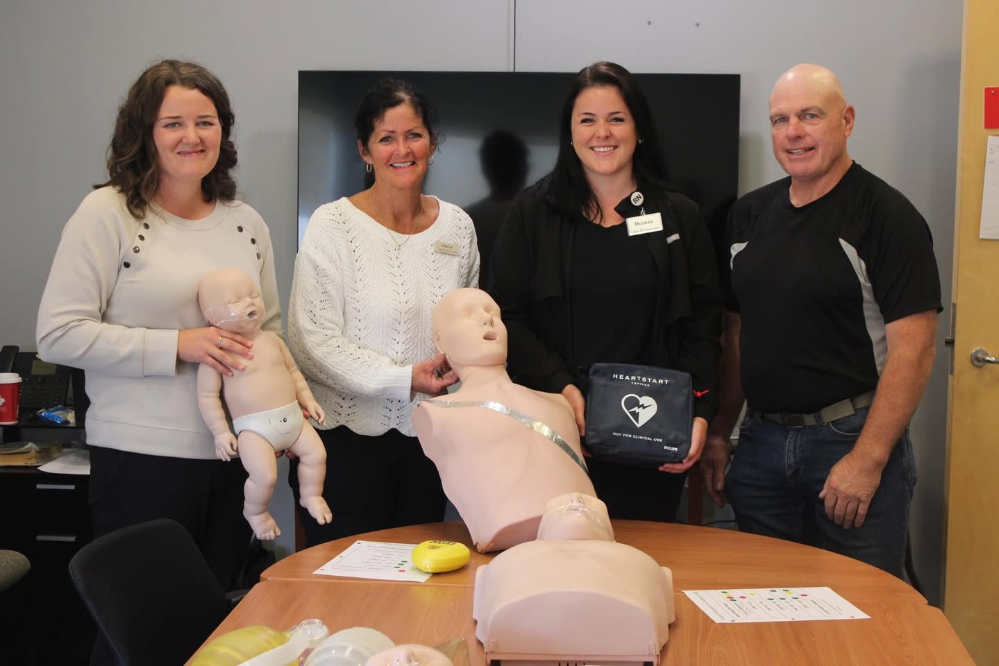 Staff training with CPR equipment at Colville Manor